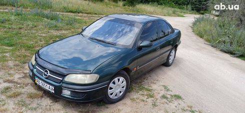 Opel Omega 1994 зеленый - фото 6