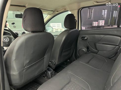 Dacia Logan 2015 белый - фото 13