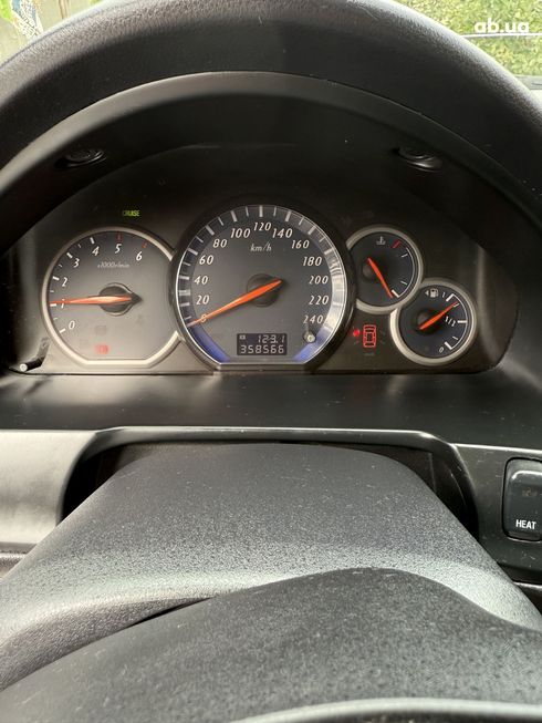 Mitsubishi Grandis 2005 серебристый - фото 7
