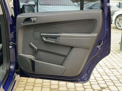 Opel Zafira 2011 - фото 29