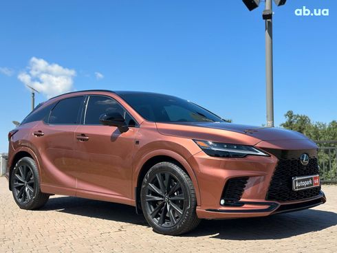 Lexus RX 2023 оранжевый - фото 11