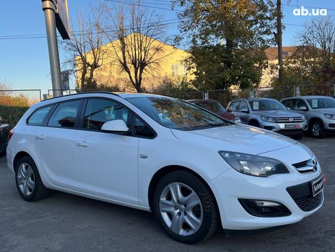 Opel astra j 2014 белый - фото 3