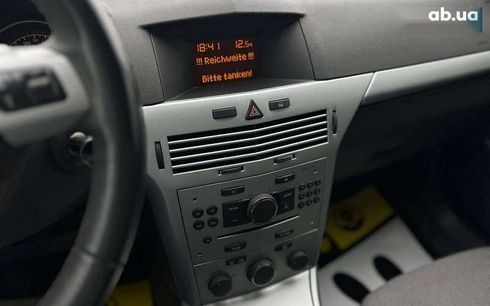 Opel Astra 2009 - фото 16