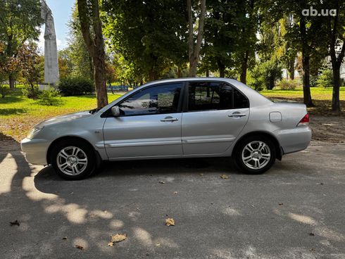 Mitsubishi Lancer 2005 серый - фото 12