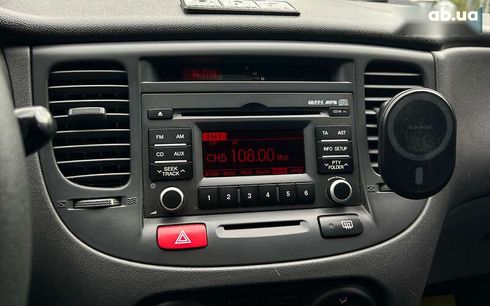 Kia Rio 2010 - фото 13