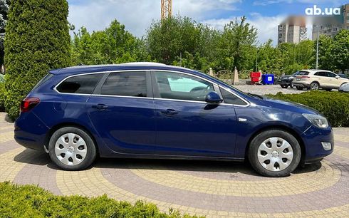 Opel Astra 2011 - фото 8