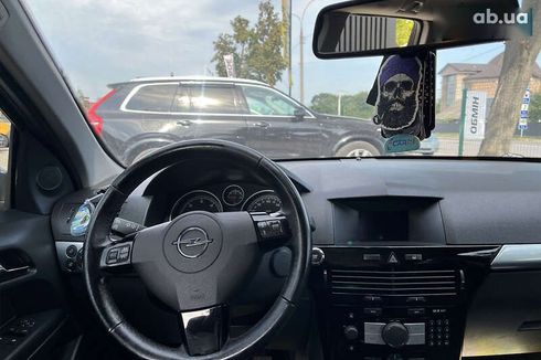 Opel Astra 2009 - фото 19
