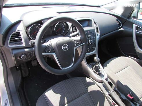 Opel Astra 2010 - фото 8