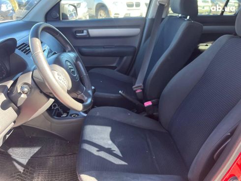 Suzuki Swift 2010 красный - фото 17