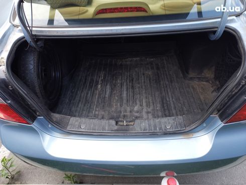 Chevrolet Aveo 2008 голубой - фото 3