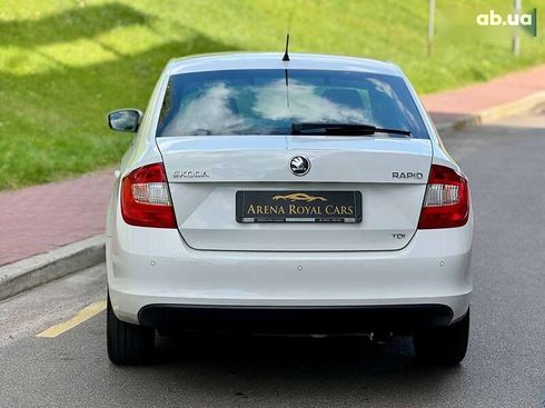 Skoda Rapid 2013 - фото 8