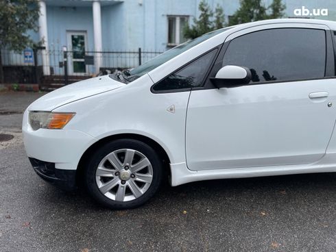 Mitsubishi Colt 2010 белый - фото 47