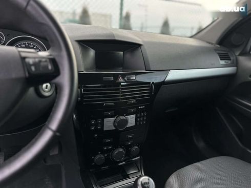 Opel Astra 2010 - фото 28
