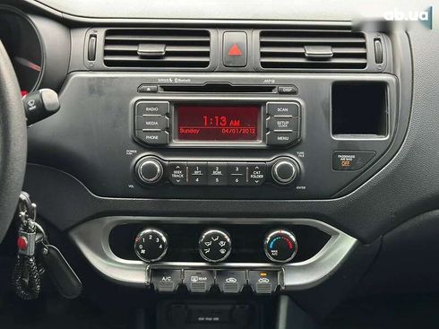 Kia Rio 2013 - фото 24