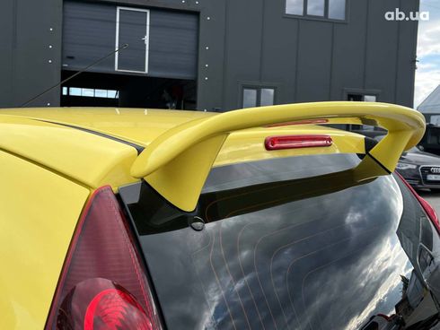 Peugeot 107 2012 желтый - фото 14