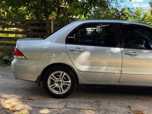 Mitsubishi Lancer 2005 серый - фото 10