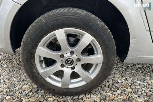 Opel Astra 2010 - фото 8