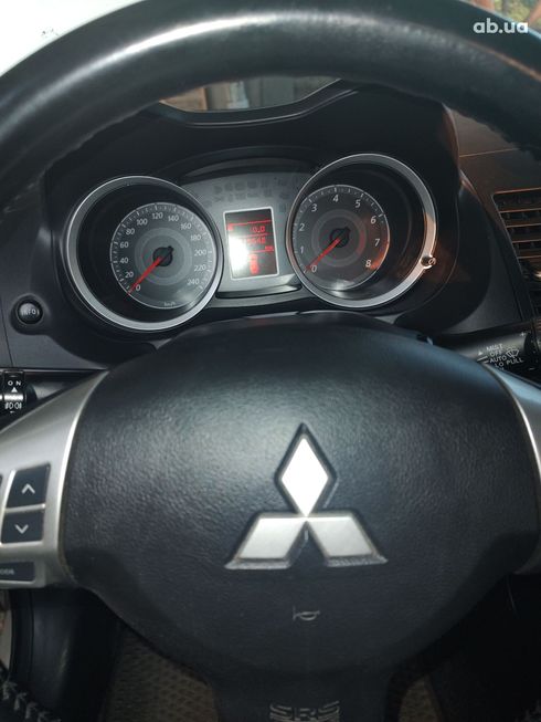Mitsubishi Lancer 2009 белый - фото 6