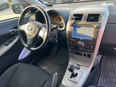 Toyota Corolla 2008 синий - фото 39