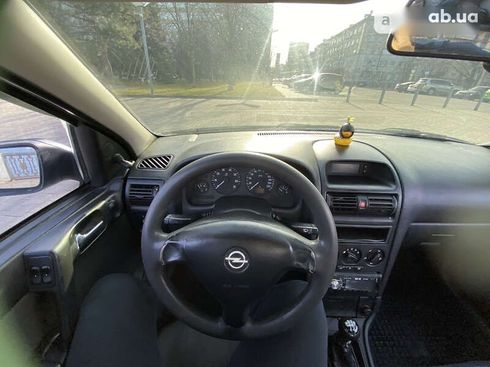 Opel Astra 2008 - фото 17