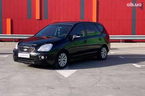 Kia Carens 2010 - фото 3