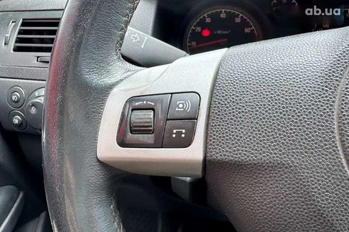 Opel Astra 2010 - фото 16