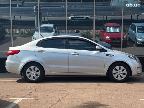 Kia Rio 2013 - фото 7