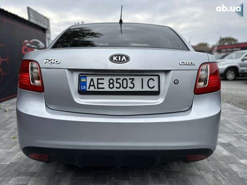 Kia Rio 2010 - фото 11