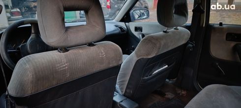Mazda 323 1990 белый - фото 15