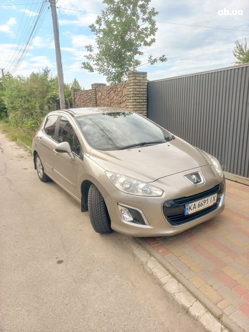 Peugeot 308 2011 золотистый - фото 2