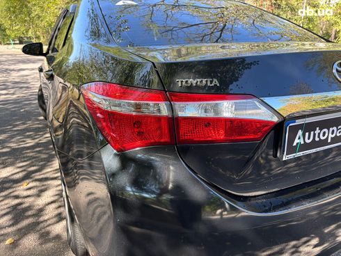 Toyota Corolla 2016 черный - фото 13
