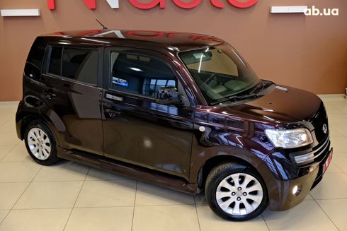 Daihatsu Materia 2008 вишневый - фото 4