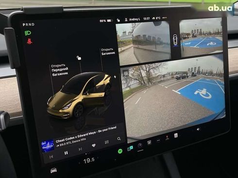 Tesla Model Y 2024 - фото 30