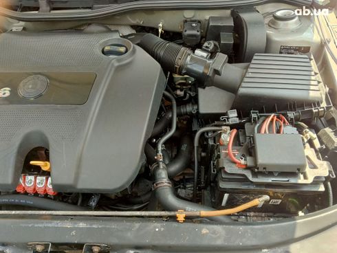 Skoda Octavia 2010 серебристый - фото 9