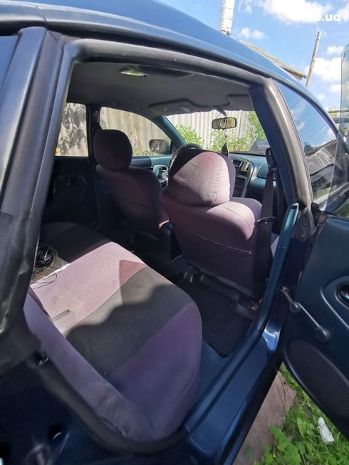 Mazda 323 1998 синий - фото 11