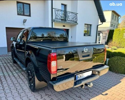 Nissan Navara 2008 черный - фото 8