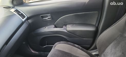 Mitsubishi Outlander XL 2011 черный - фото 5