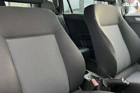 Opel Astra 2010 - фото 27