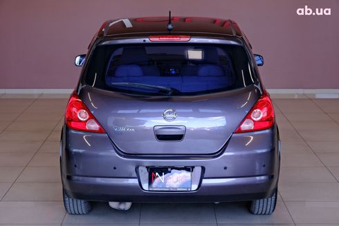 Nissan Tiida 2009 фиолетовый - фото 6