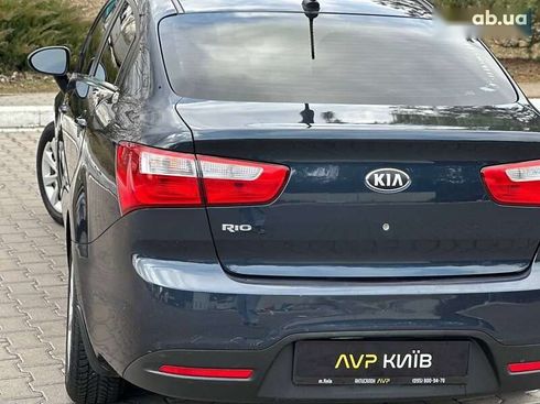 Kia Rio 2013 - фото 13