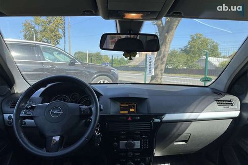 Opel Astra 2010 - фото 21