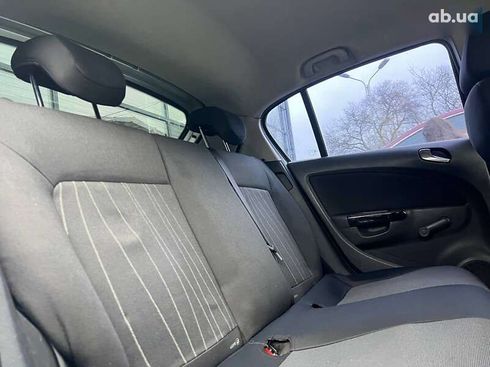 Opel Corsa 2008 - фото 11