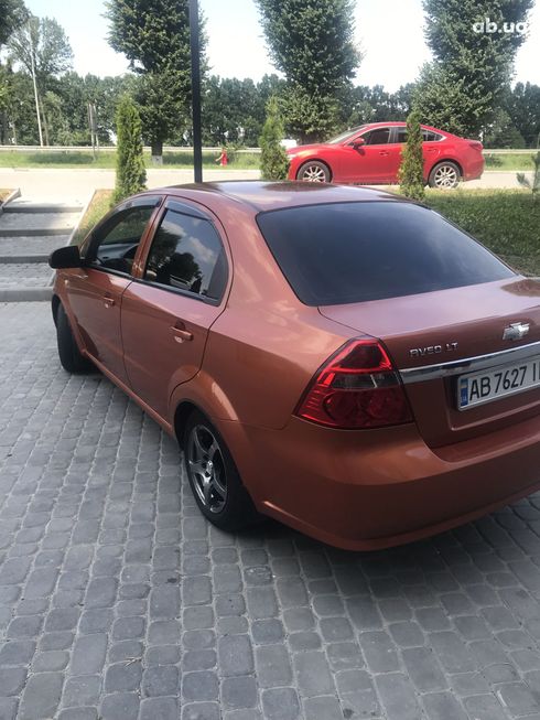 Chevrolet Aveo 2008 оранжевый - фото 5