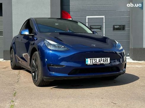 Tesla Model Y 2024 - фото 12