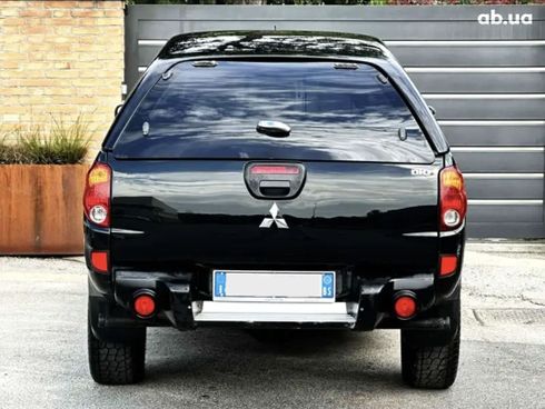 Mitsubishi L200 2007 черный - фото 10