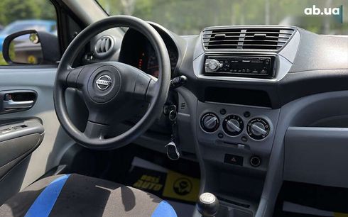 Nissan Pixo 2010 - фото 13