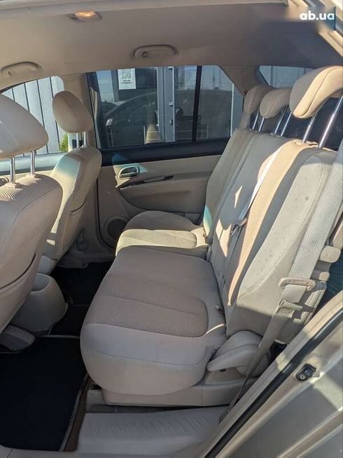 Kia Carens 2007 - фото 16