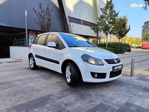 Suzuki SX4 2009 - фото 26