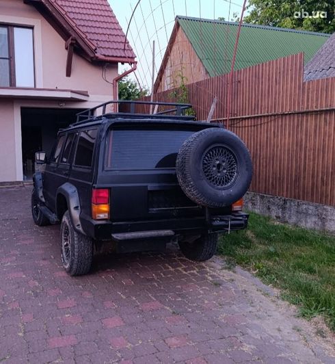 Jeep Cherokee 1992 черный - фото 4