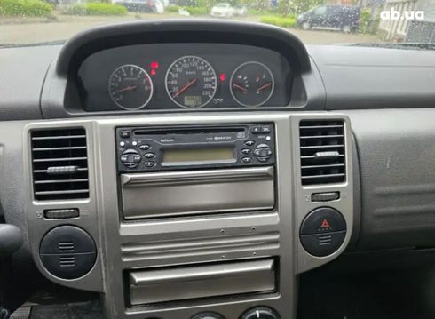 Nissan Navara 2006 черный - фото 2